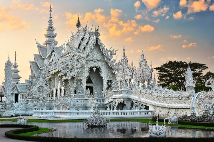 Wat Rong Khun, also known as the "White Temple designed by artist Ajarn Chalermchai Kositpipat, 