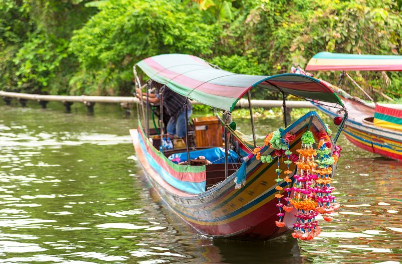 Long tail boat in Chao Phraya river in Bangkok, Thailand in a summer day