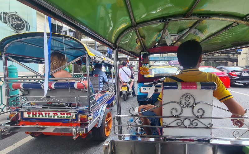 Tuk Tuks in Bangkok traffic, Thailand