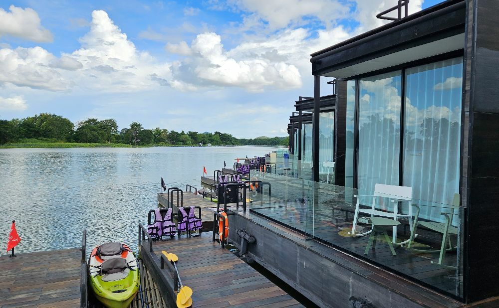 Raft hotel in kanchanaburi with a kayak