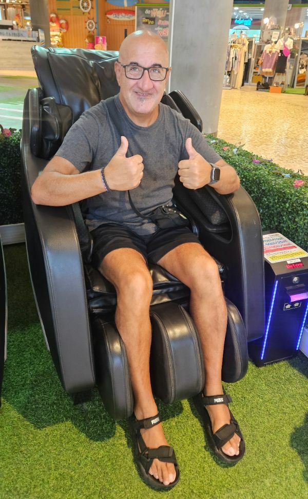 Charles in a massage chair in BluPort Hua Hin