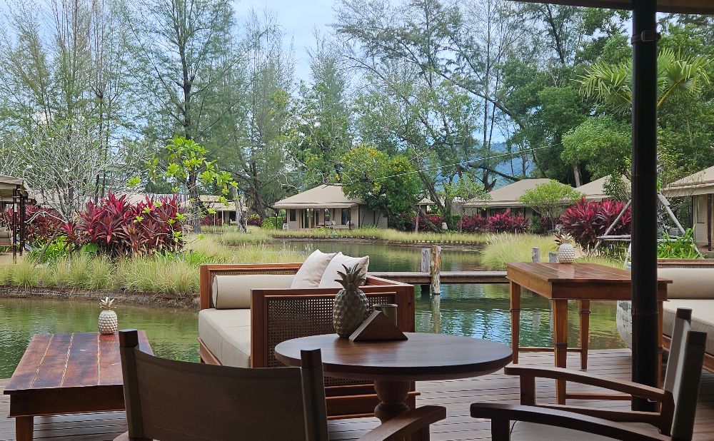 Check-in area at TwinPalms Bang Tao Beach looking across the lagoon to the tents
