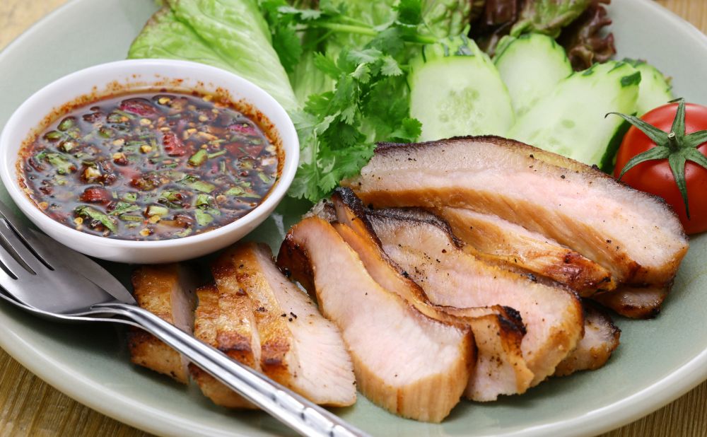 Kor Moo Yang ( charcoal grilled pork jowl meat)