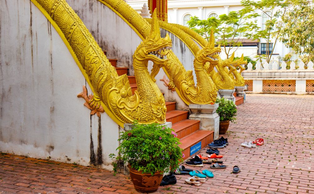 shoes at the bottome of temple steps
