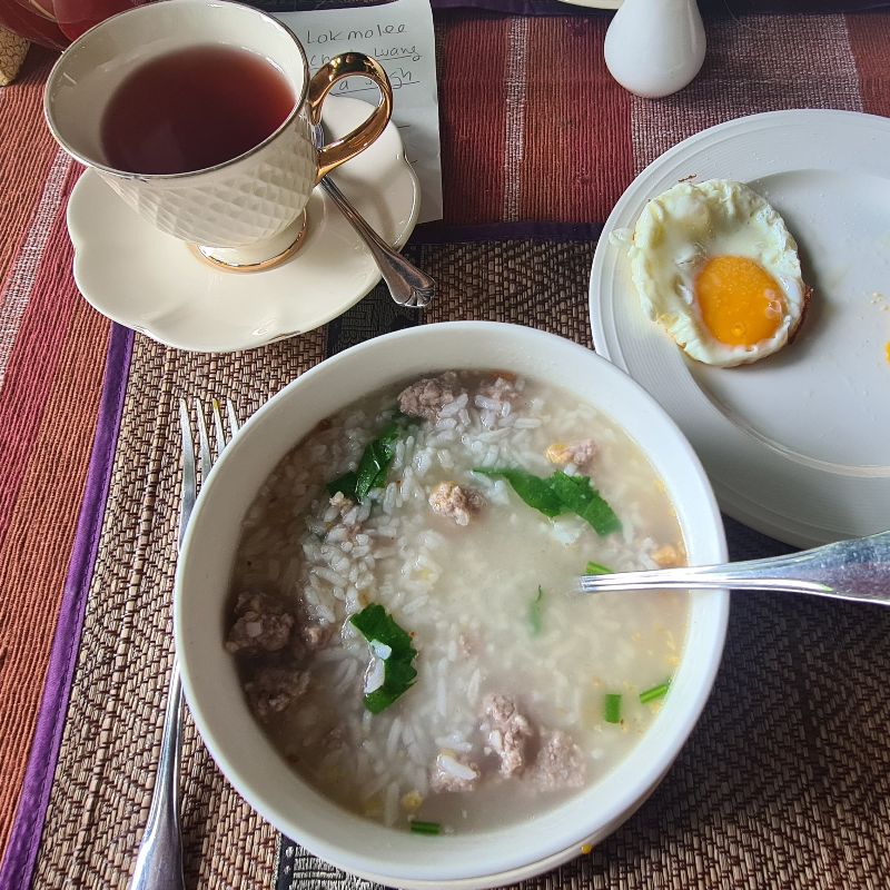 Khao Tom breakfast set with tea and fried egg